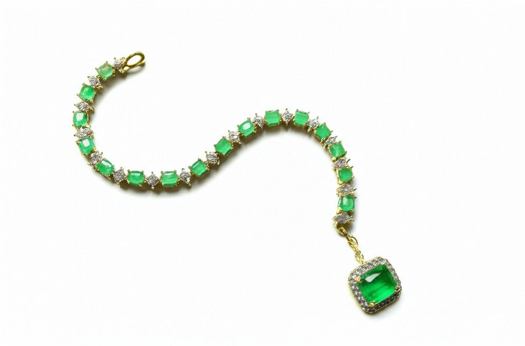 Women's emerald gold and diamond bracelet
