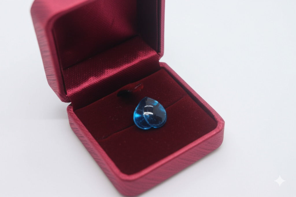 Swiss blue topaz and diamond engagement ring