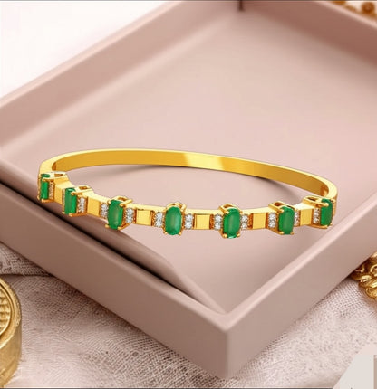 Women's emerald gold and diamond bracelet