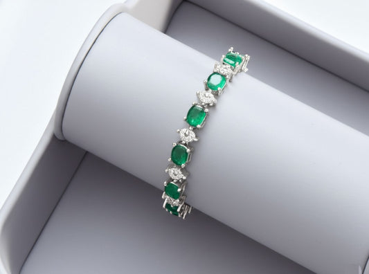 Women's emerald white gold and diamond bracelet