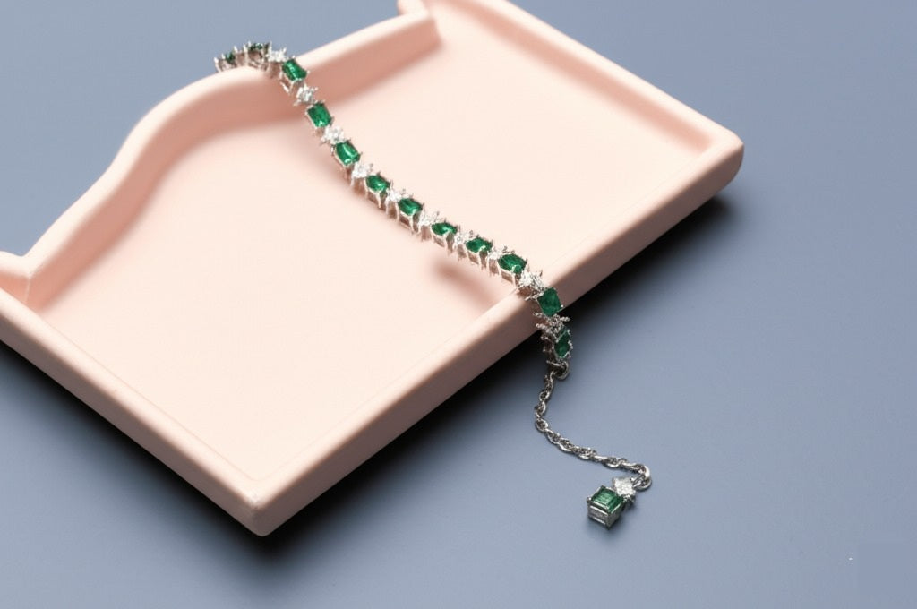 Women's emerald white gold and diamond bracelet