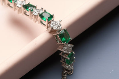Women's emerald white gold and diamond bracelet