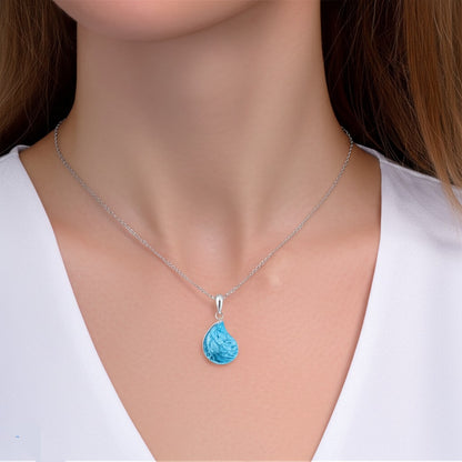 Sky blue topaz pendant and ring
